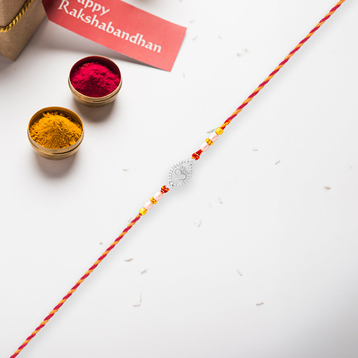 Silver Om Rakhi for Brother
