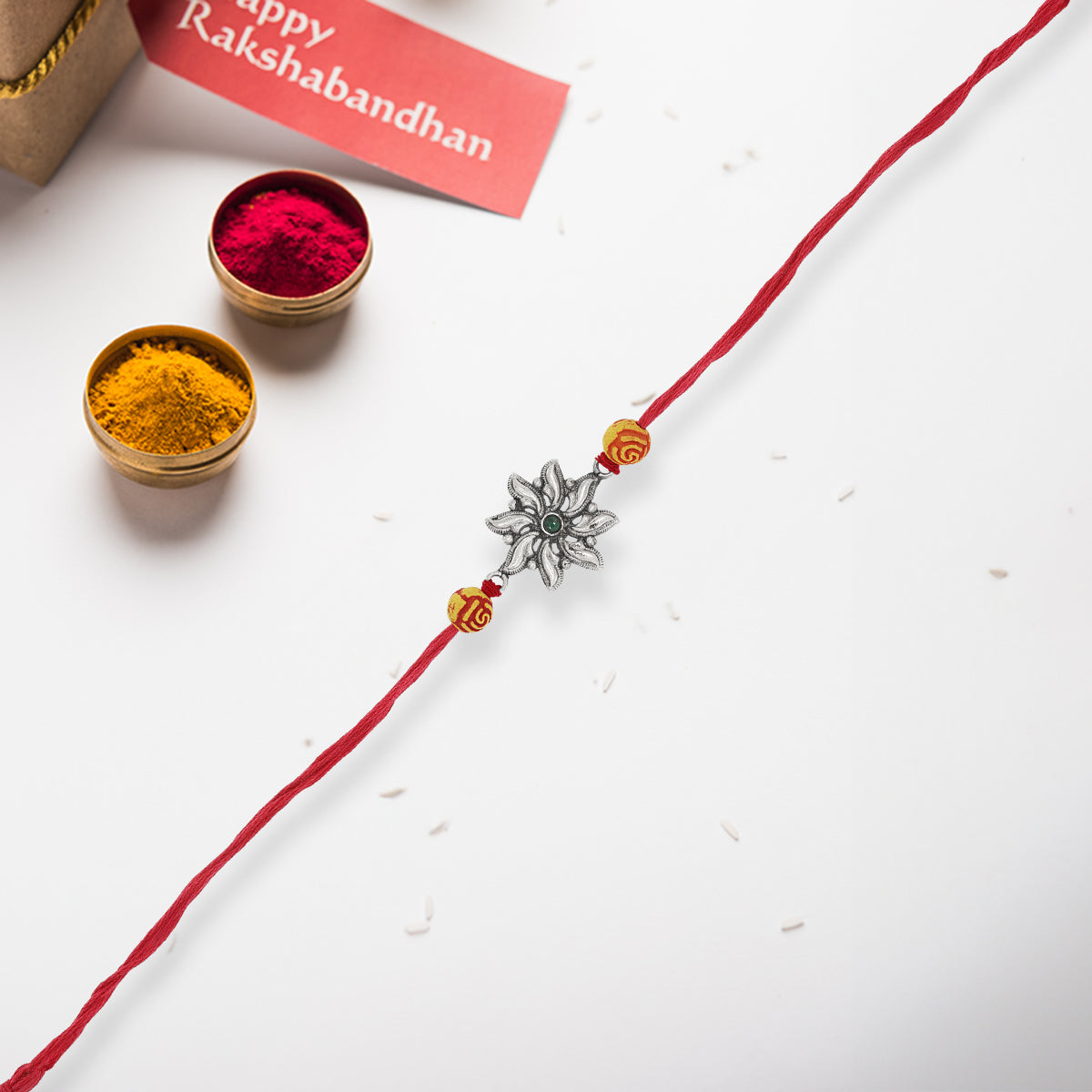 Radiant flower Silver Rakhi
