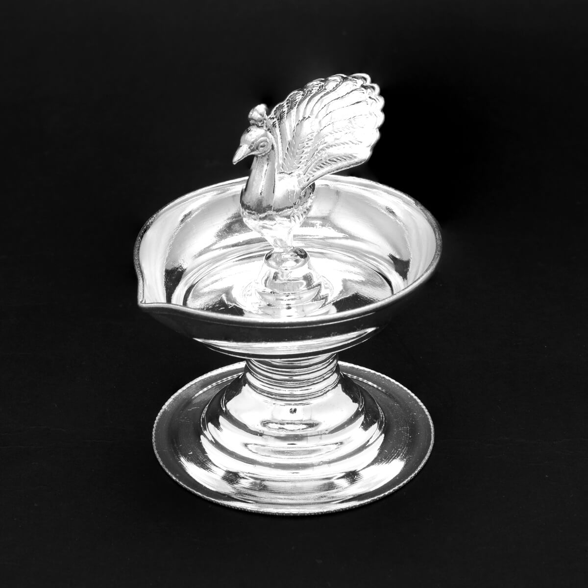 Enchanting Peacock Motif Silver Diva