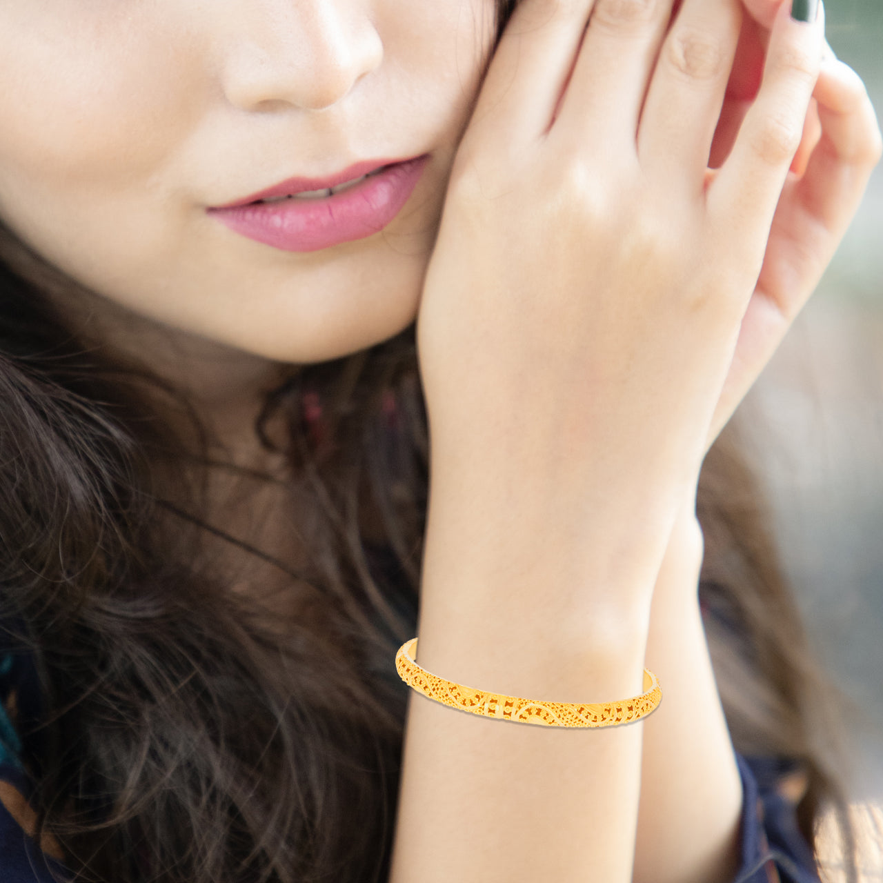 Artisian Elegance Gold Bangle