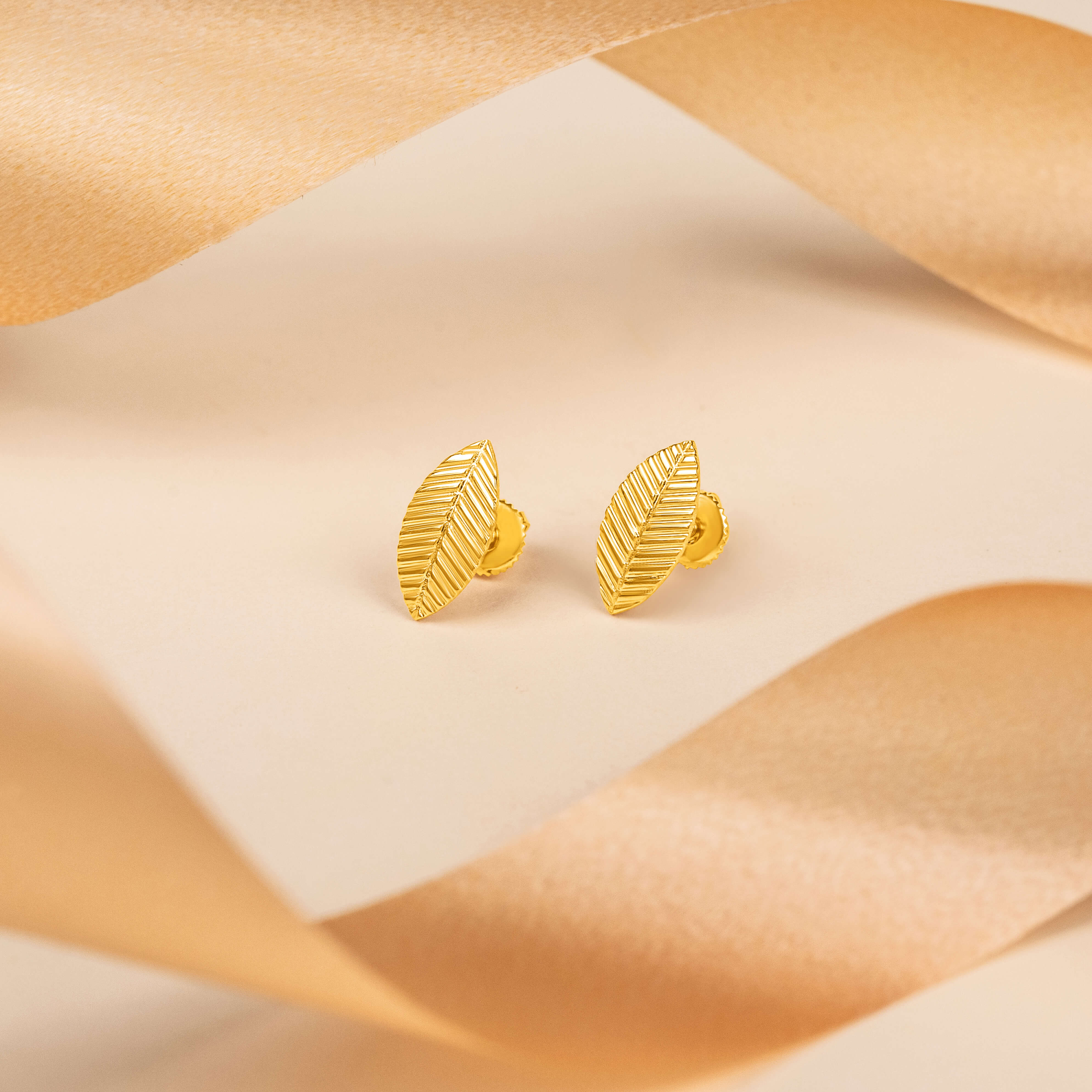 Polished Elegance Gold Foliate Studs 18K