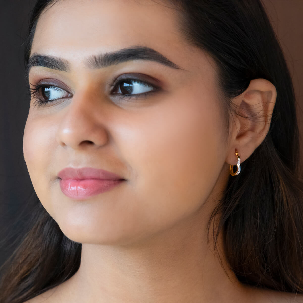 Gold Hoop Earrings with a Graceful Curve