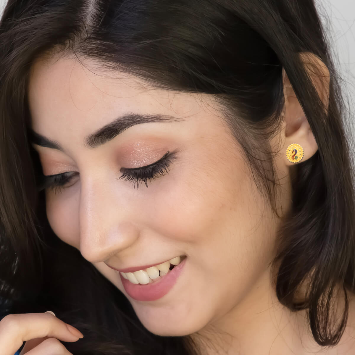 Vibrant gemstone Peacock Motif 22K Gold Studs